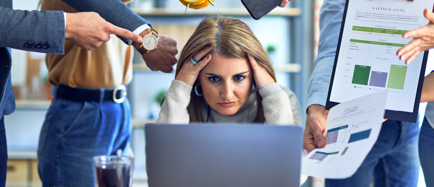 Women with hands on head overwhelmed