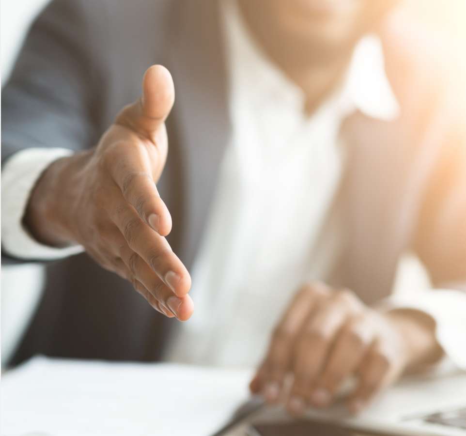 Person offering a handshake